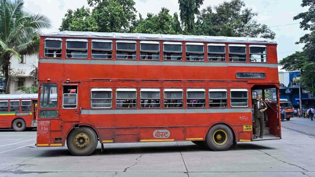 Mumbai’s iconic red double-decker BEST bus travelling on city roads