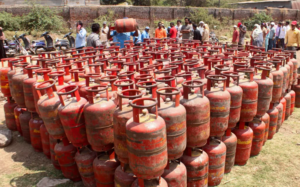 LPG gas cylinders stored outside a gas agency in India representing the country’s cooking fuel supply network