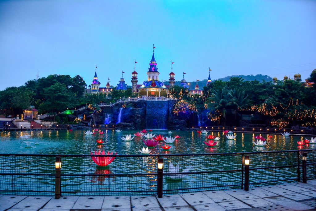 Families enjoying the Diwali Carnival at Imagicaa Theme Park in Khopoli with festive lights and fireworks